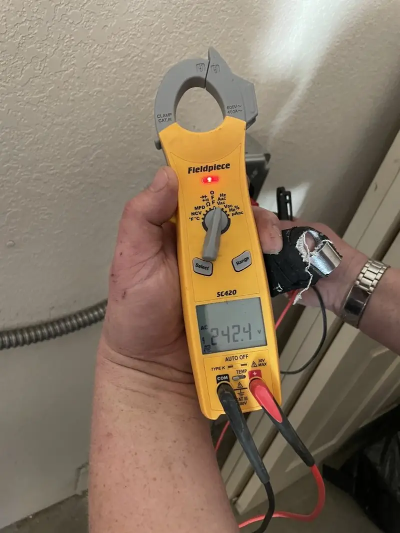 Voltage testing with clamp meter during Generator Installation in Streamwood
